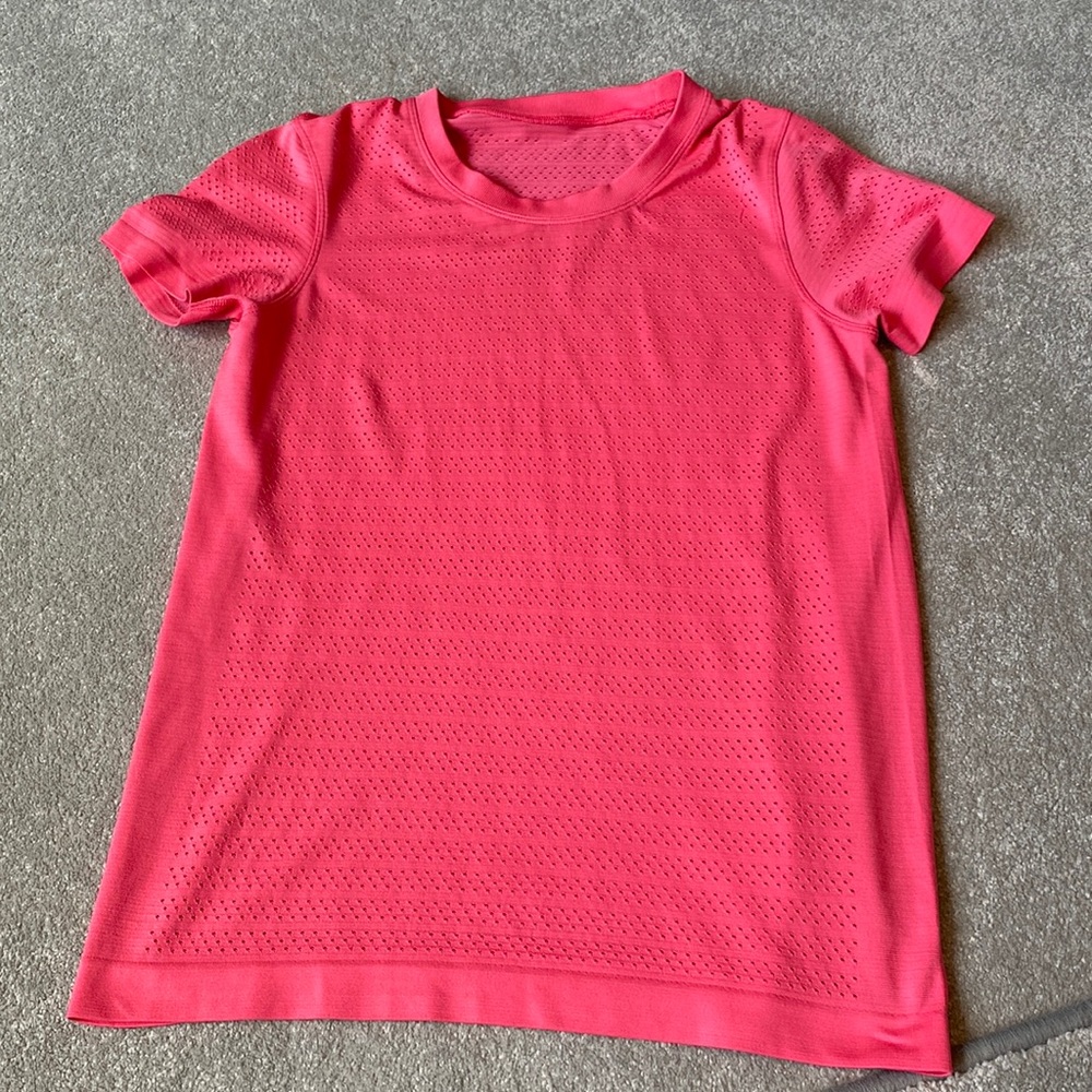 Bright pink lululemon short sleeve shirt